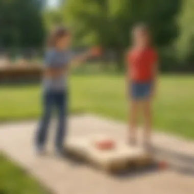 Kids engaged in a competitive game of cornhole on a sunny day